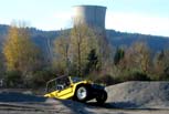 Resort Wombat in Sand in front of cooling tower.