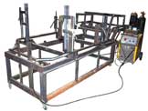 Image of Wombat steel subframe in welding jig.